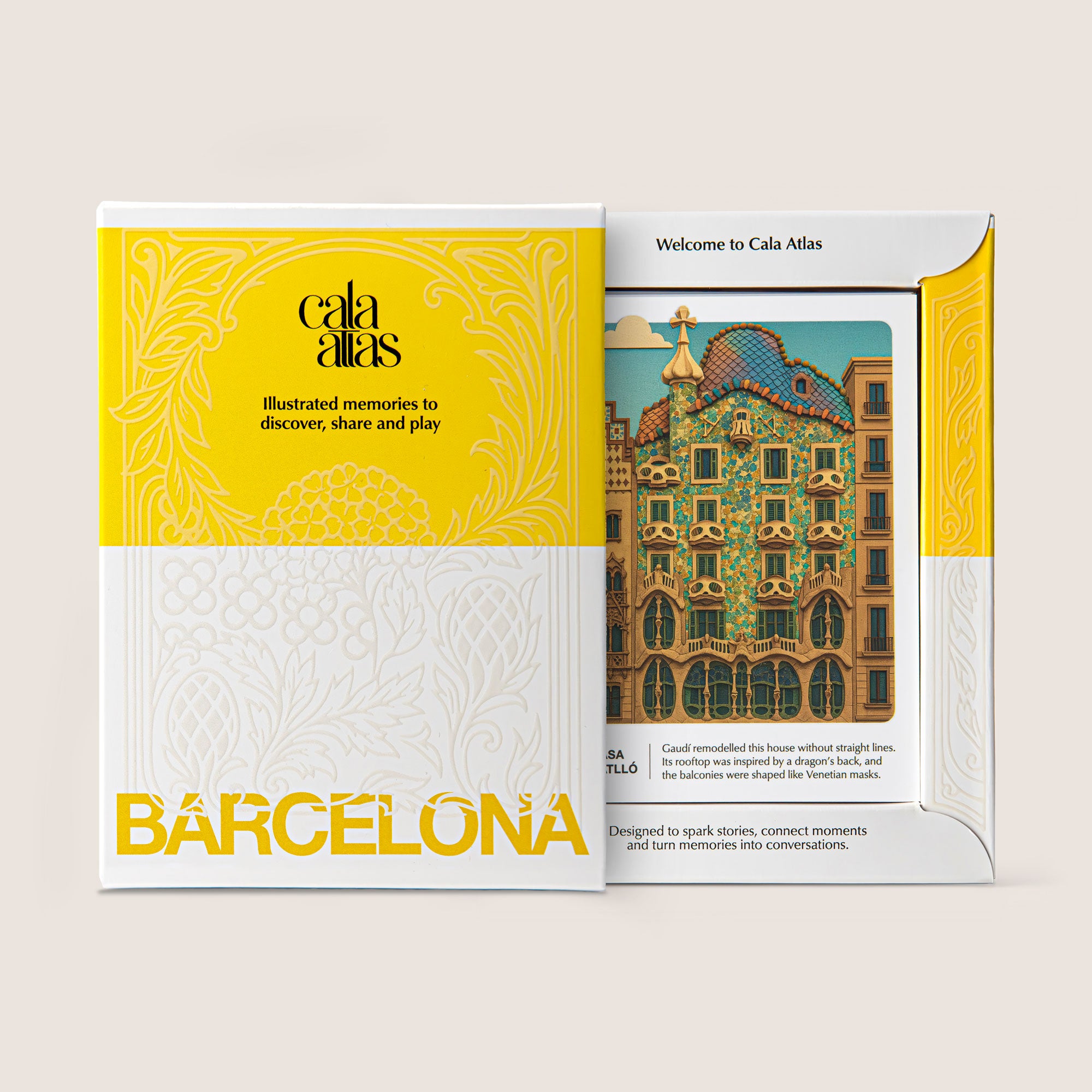 Yellow and white packaging of the Cala Atlas Barcelona Story Deck with a partially revealed illustrated Casa Batlló card