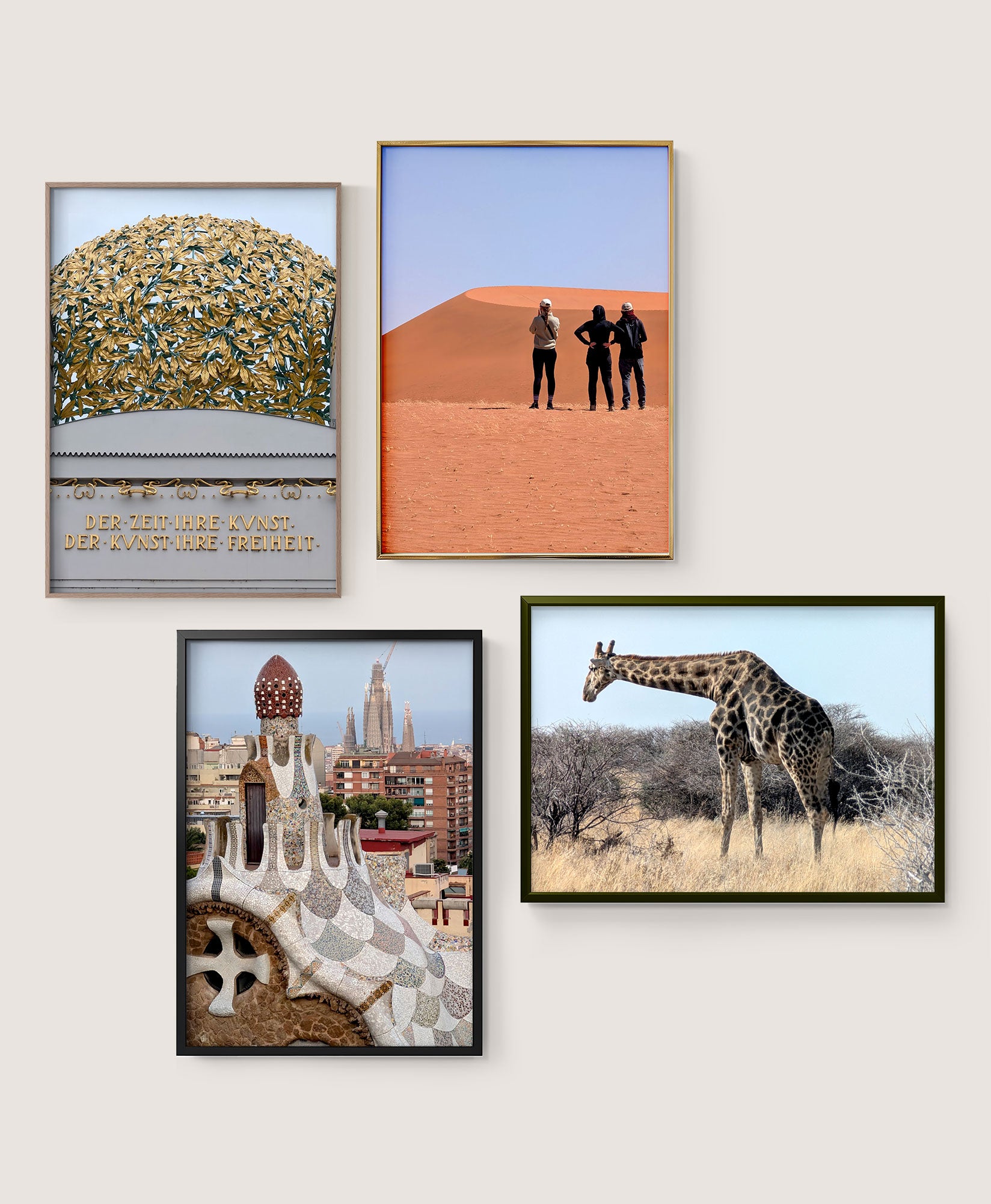Four framed photographs showing architectural details, a desert landscape, a giraffe in the wild and Barcelona’s Park Güell